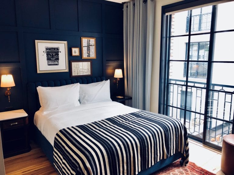 Photo of one of the queen beds inside the Juliette Queen suite of The Ramble Hotel